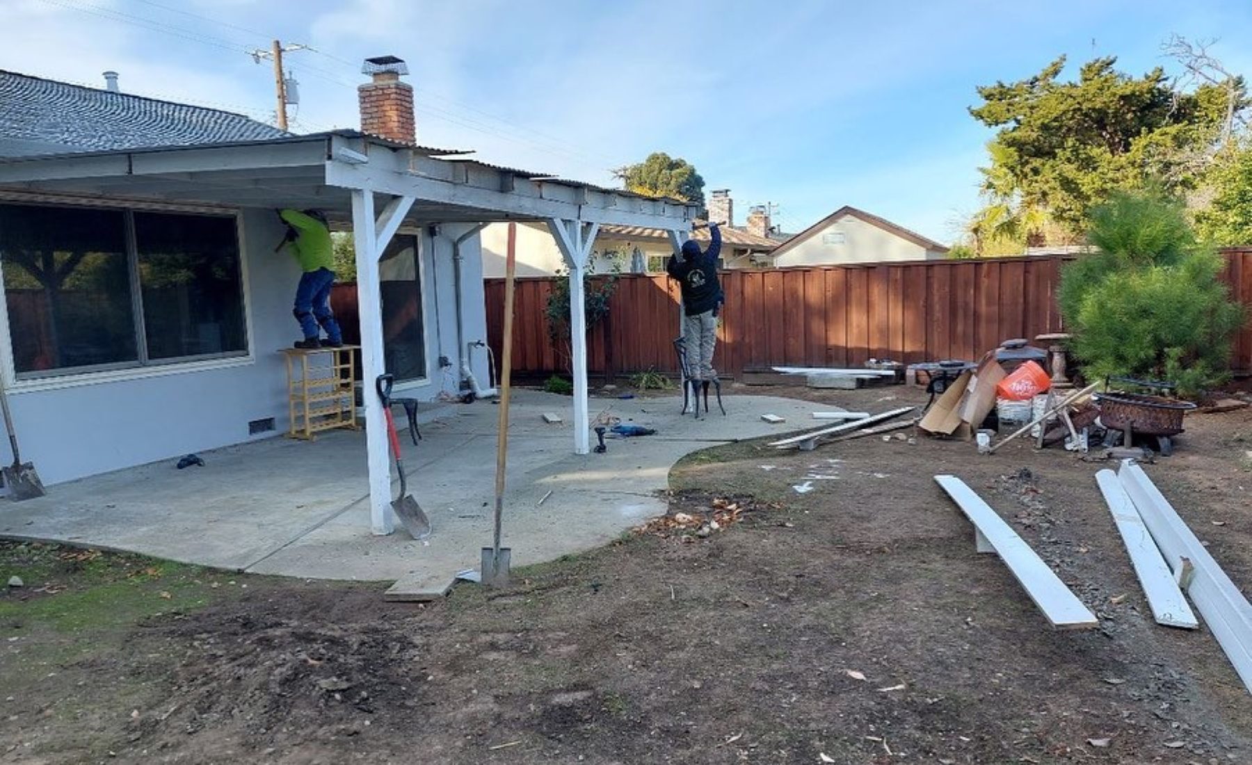 Livermore backyard during old patio cover demolition before the new patio cover, concrete patio, and turf project by FG Pavers and Turf.